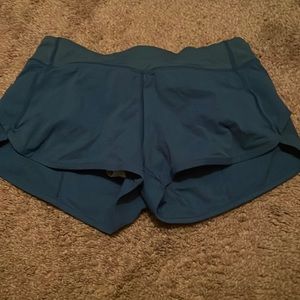 Blue and pink Ivivva Speed up shorts